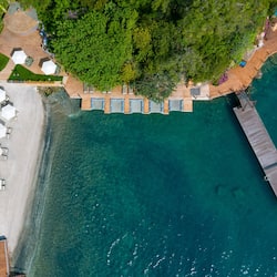 Private beach, black sand, free beach cabanas, sun loungers