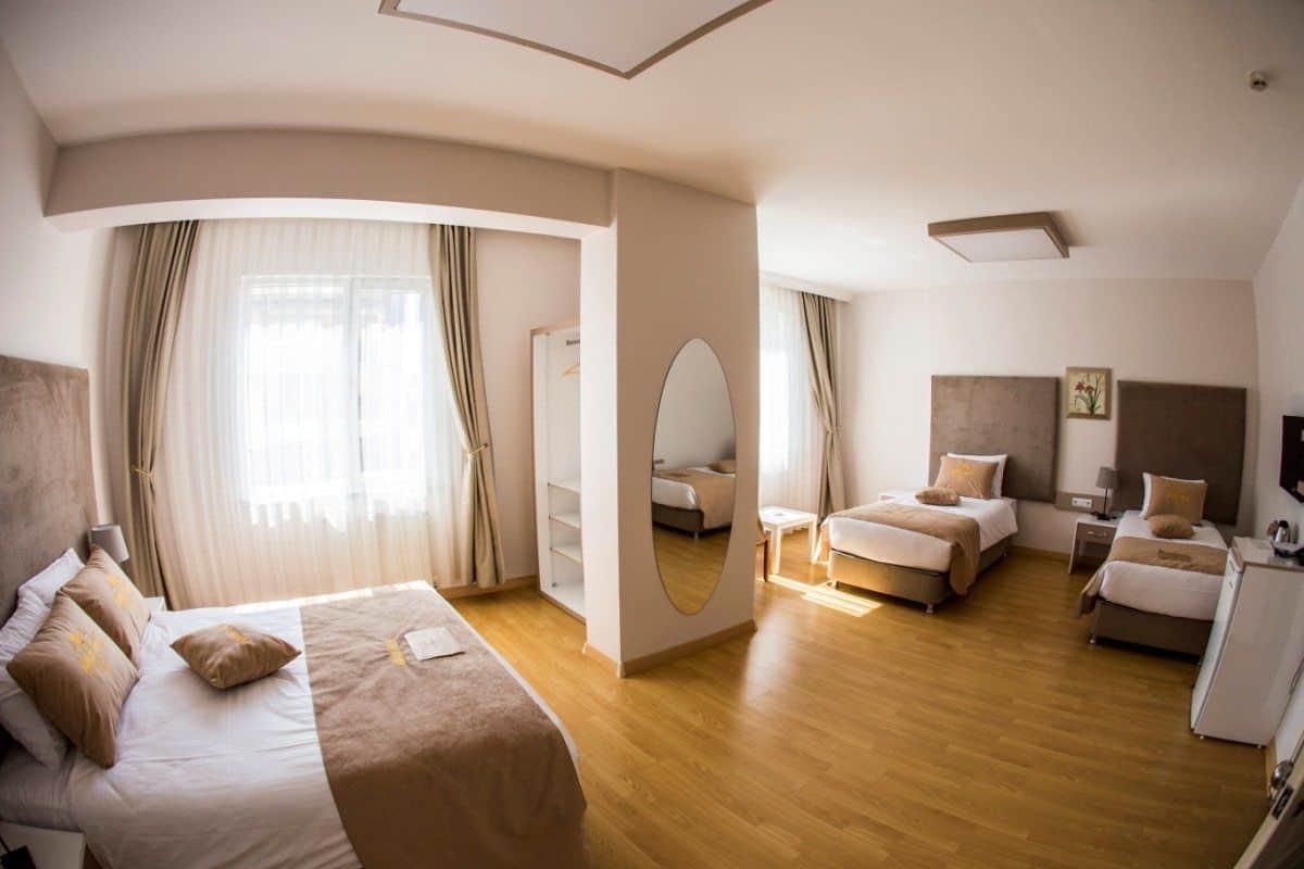 Suite familiar, 2 habitaciones | Caja de seguridad en la habitación y insonorización