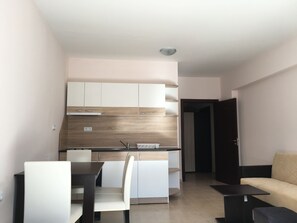 Exclusive Apartment, 1 Bedroom, Partial Sea View | Living area | Flat-screen TV, fireplace - Palace Deluxe Hotel (Pomorie)
