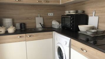 Exclusive Apartment, 1 Bedroom, Partial Sea View | Private kitchen | Fridge, microwave, stovetop, electric kettle