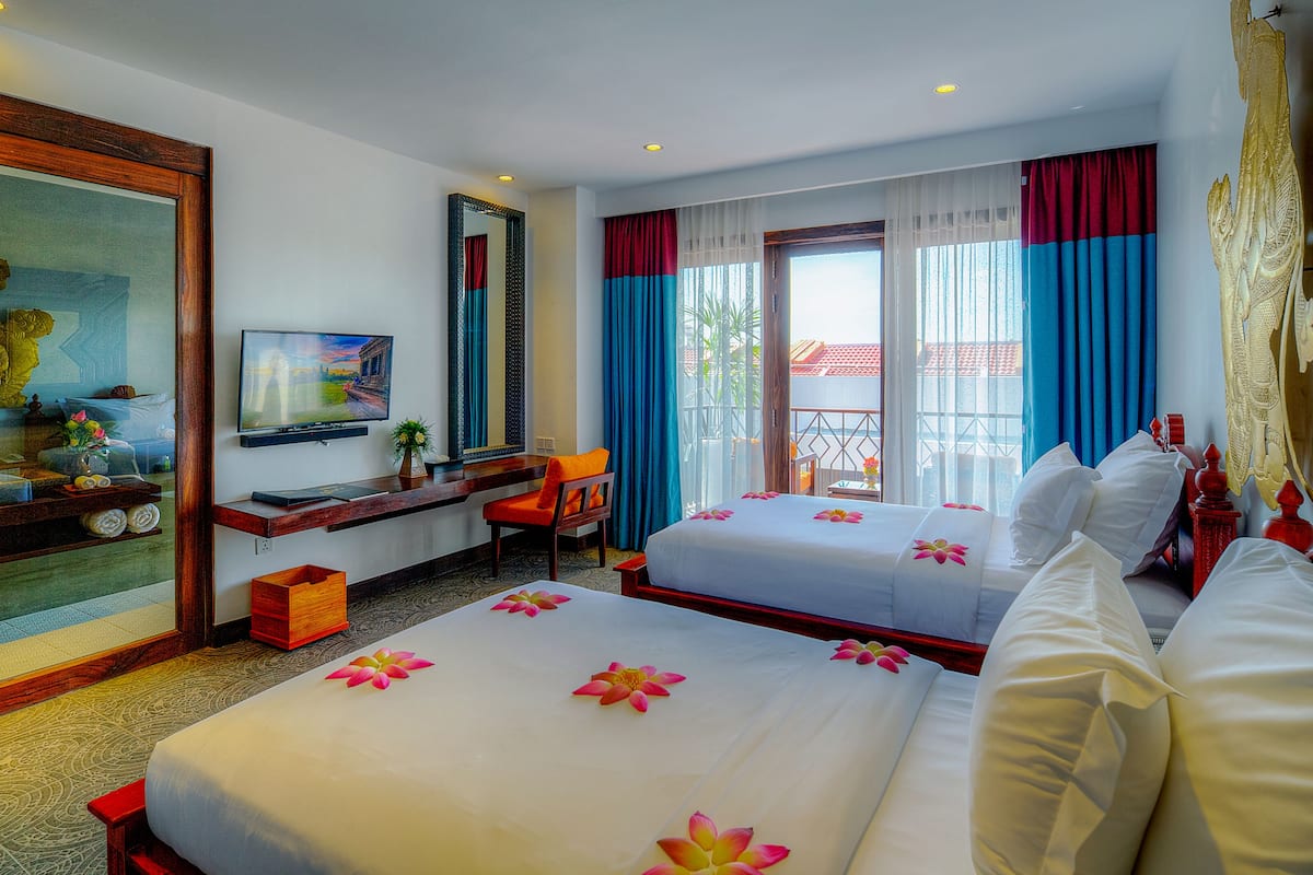 premier twin room, 2 single beds, pool view | 1 bedroom, premium bedding, down duvets, pillow-top beds