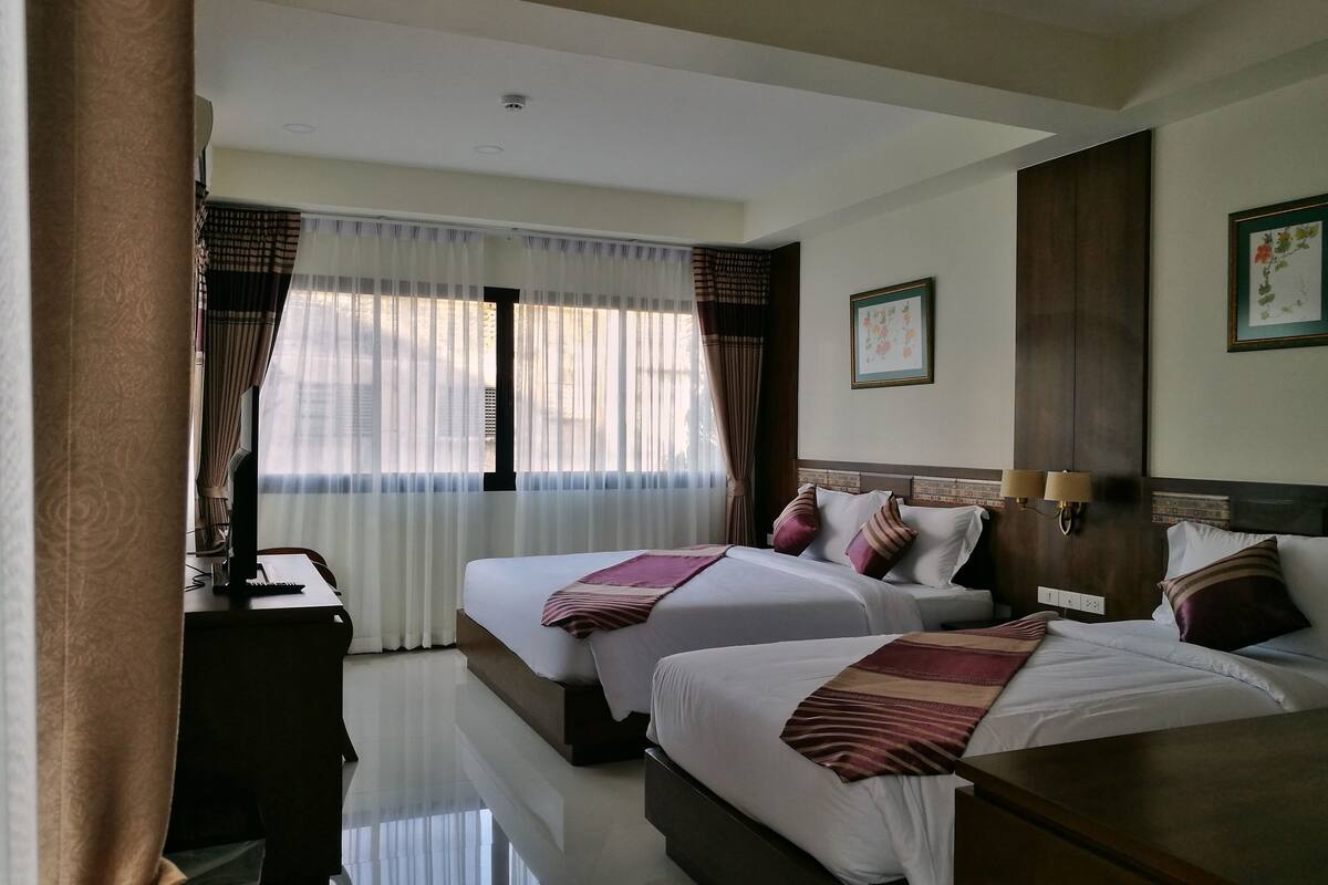 Deluxe Triple Room | Minibar, in-room safe, desk, rollaway beds (surcharge)
