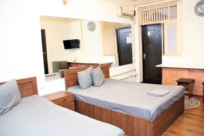 Economy Double Room, 2 Double Beds | In-room safe, blackout drapes, free WiFi, bed sheets