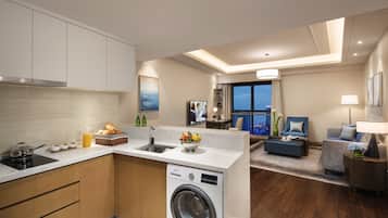 Departamento Deluxe, 1 habitación | Edredón, caja de seguridad en la habitación y escritorio