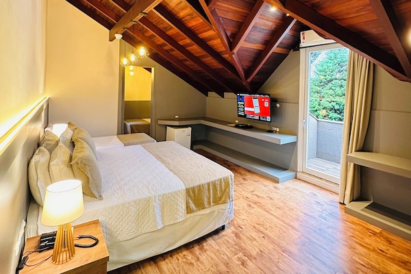 Apartament de luxe (Quadruple) | Matalassos amb encoixinament addicional i minibar