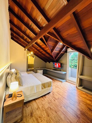 Apartament de luxe (Quadruple) | Matalassos amb encoixinament addicional i minibar 