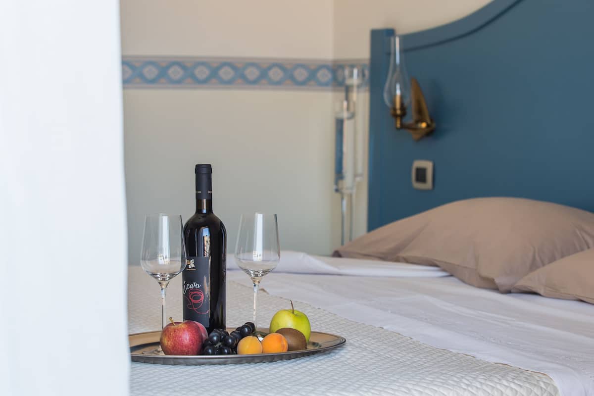 Triple Room | Premium bedding, minibar, in-room safe, desk