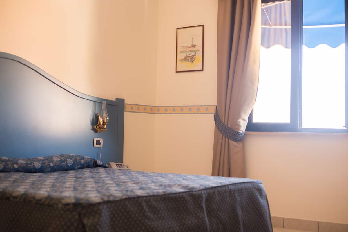 Quadruple Room | Premium bedding, minibar, in-room safe, desk