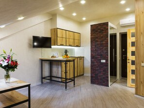 Comfort Studio | Private kitchenette | Stovetop, electric kettle, griddle, cleaning supplies - CityApartments Kyiv Maidan (Kyiv)