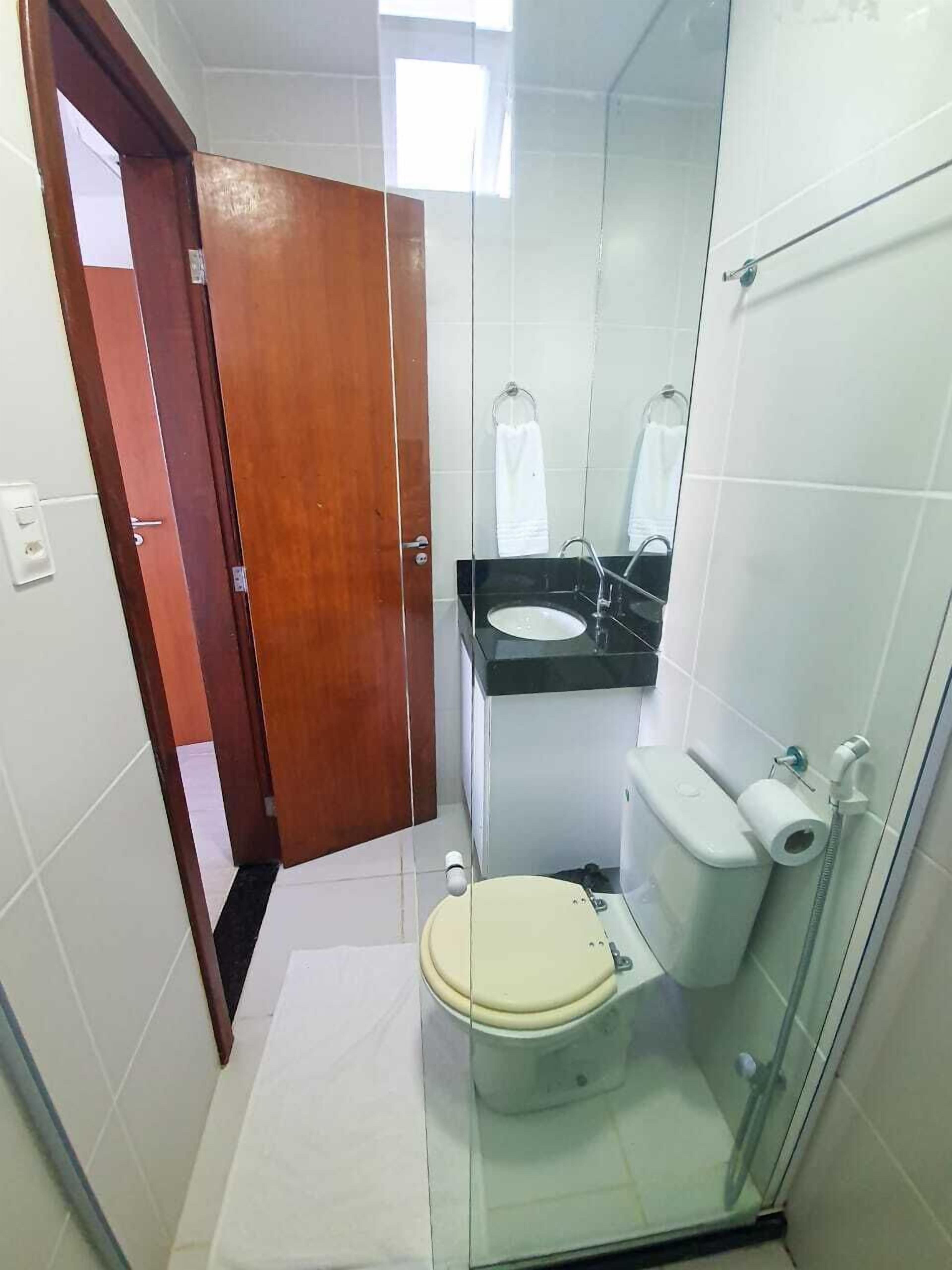 deluxe apartment, 2 bedrooms, pool view | bathroom | shower, free toiletries, towels