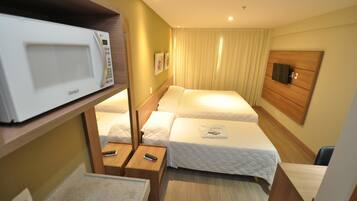 Family Triple Room | Minibar, desk, blackout curtains, iron/ironing board (on request)