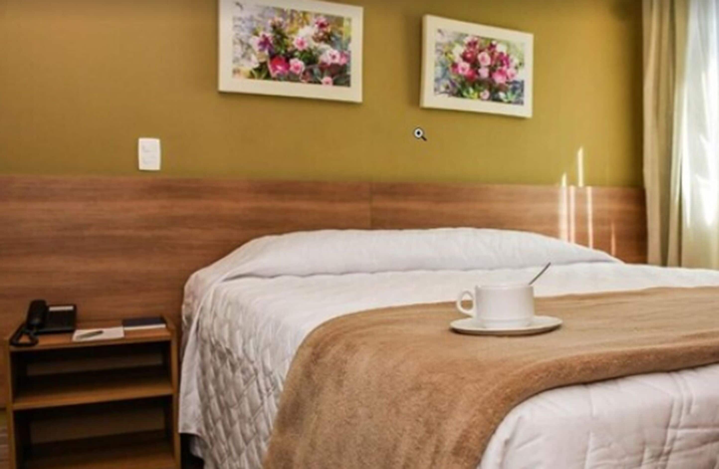 minibar, desk, blackout curtains, iron/ironing board