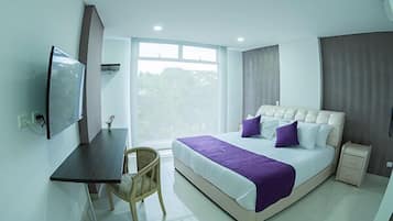 Premium bedding, down comforters, minibar, in-room safe