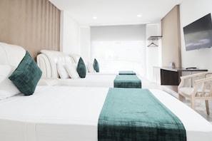 Standard-Dreibettzimmer, 3 Einzelbetten, Nichtraucher | Hochwertige Bettwaren, Daunenbettdecken, Minibar, Zimmersafe