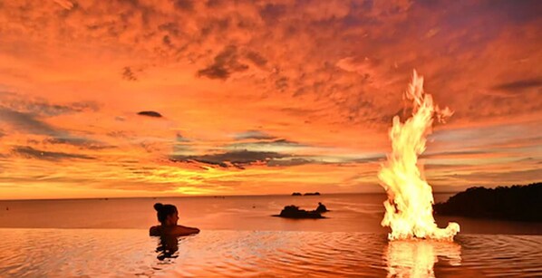 Outdoor pool, open 8 AM to 10 PM, free cabanas, pool umbrellas