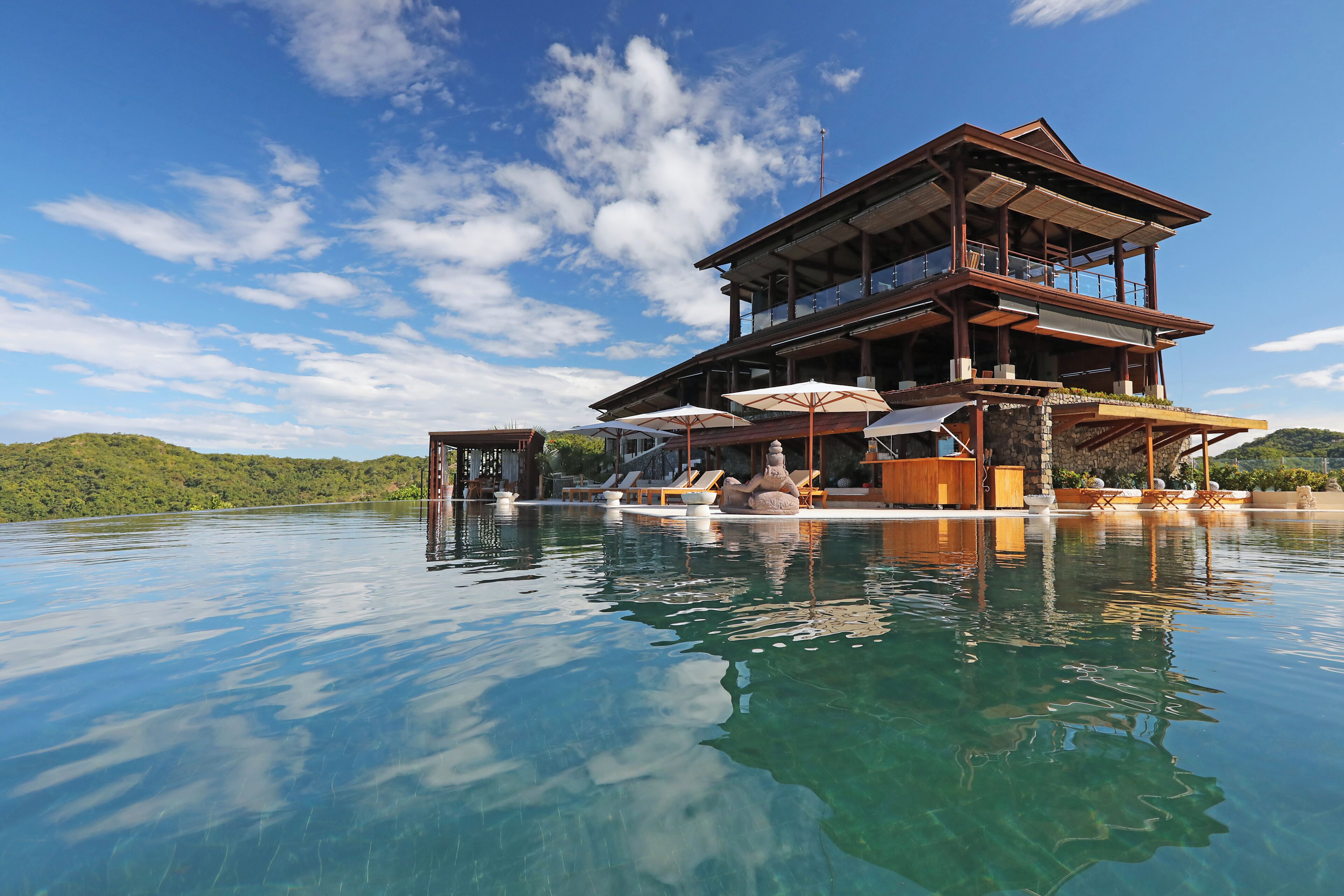 Outdoor pool, open 8 AM to 10 PM, free pool cabanas, pool umbrellas