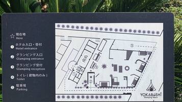 A hotel floor plan with labeled sections including the hotel entrance, glamping entrance, glamping reception, toilet, and parking.