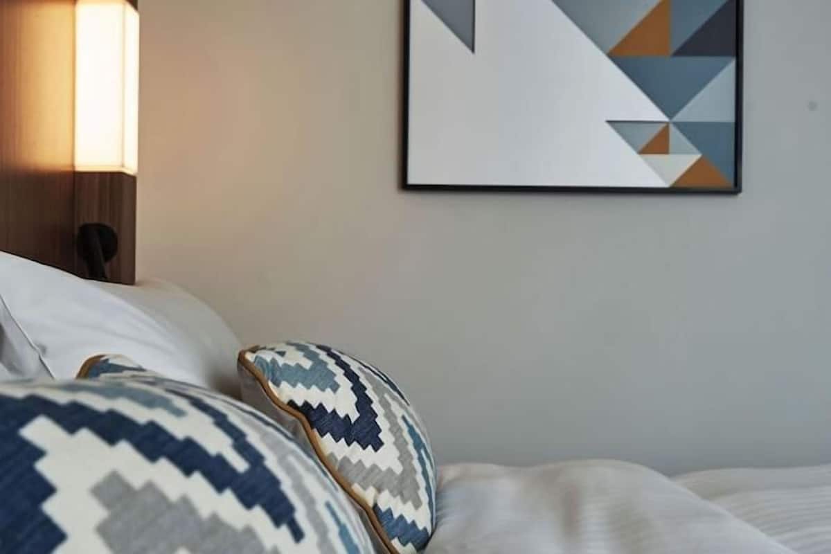Premium bedding, in-room safe, desk, soundproofing