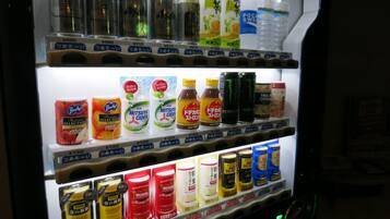 A vending machine with various beverages and snacks.