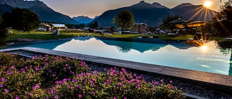 Indoor pool, outdoor pool, pool umbrellas, sun loungers