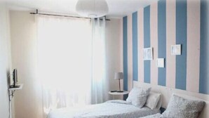 Habitación con 1 cama matrimonial o 2 individuales, baño compartido