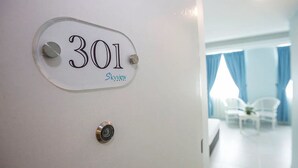 A hotel room number 301 with a door handle and a keyhole. - Skyview Hotel (Chukai)