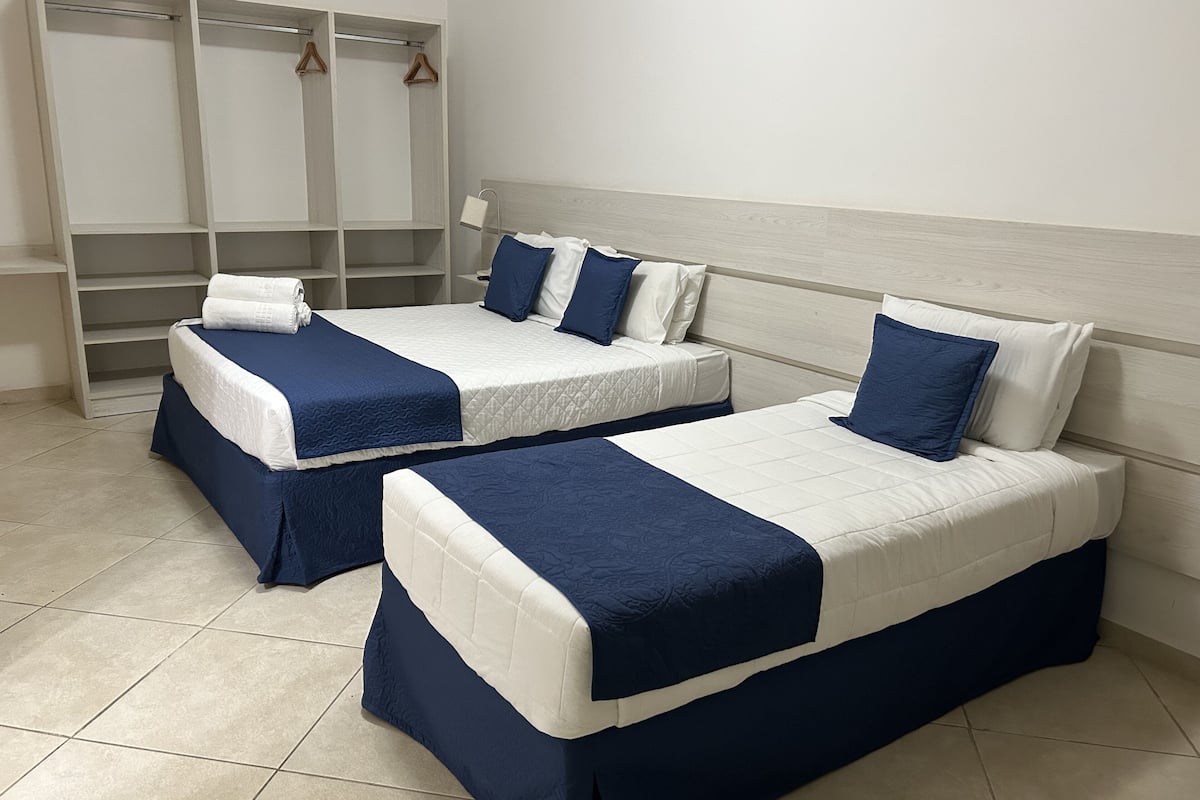 Deluxe-Dreibettzimmer