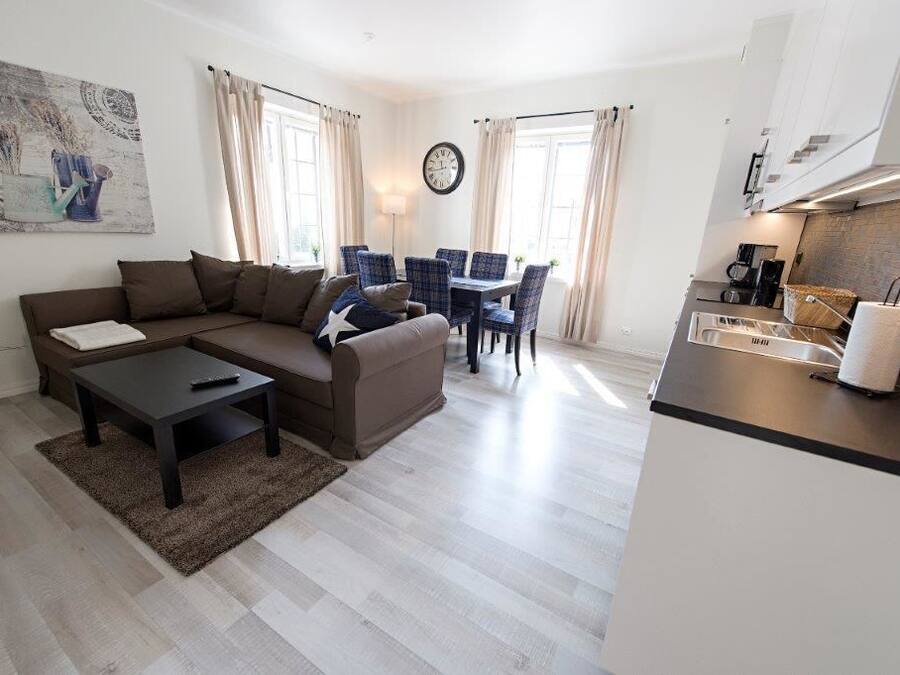 Apartment, 2 Bedrooms | Living area | 50-inch flat-screen TV with cable channels, TV