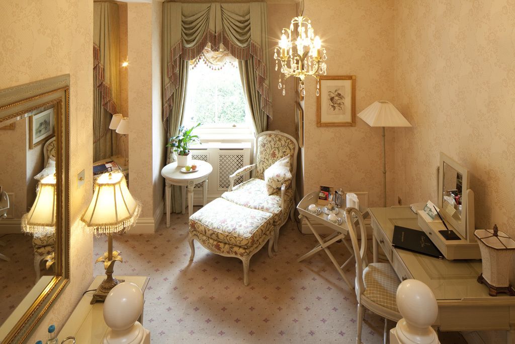 luxury double room | living area | flat-screen tv, dvd player