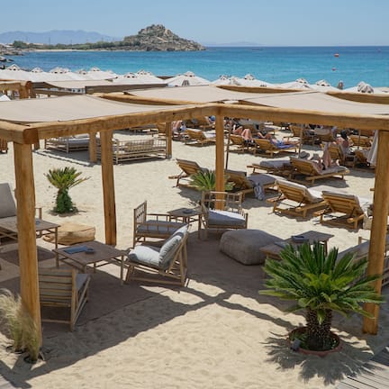 On the beach, sun loungers, beach umbrellas, beach towels