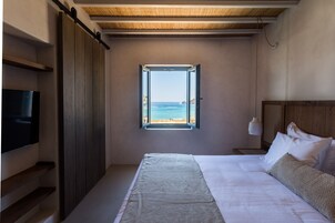 Habitación doble superior, vistas al mar | Minibar, caja fuerte, cortinas opacas y sistema de insonorización