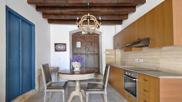Family Apartment | Private kitchen | Fridge, microwave, oven, stovetop