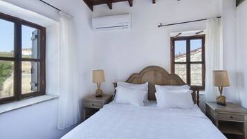 Apartment, 2 Bedrooms | In-room safe, soundproofing, iron/ironing board, free cribs/infant beds