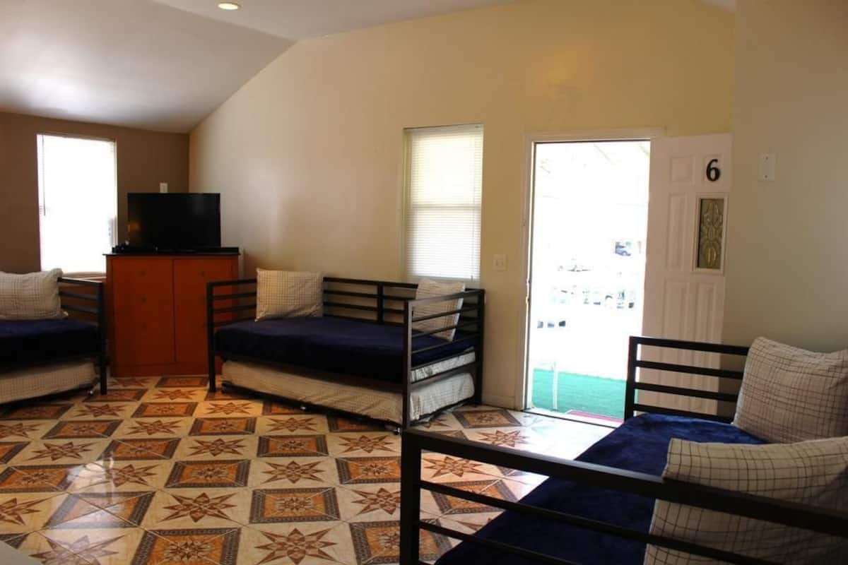Comfort Apartment, Kitchen, Beachside | Living area | Flat-screen TV