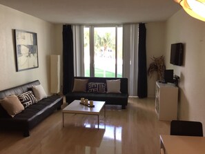 Apartment, 1 Bedroom, Balcony, Oceanfront | Iron/ironing board, rollaway beds