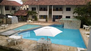 Outdoor pool, pool umbrellas, pool loungers