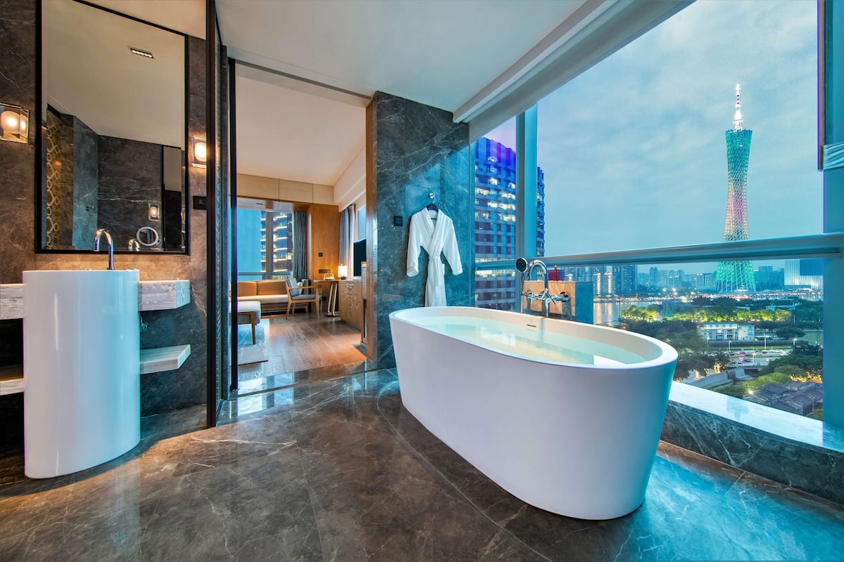 king panoramic room canton tower river view | bathroom | separate bathtub and shower, hair dryer, bathrobes, slippers