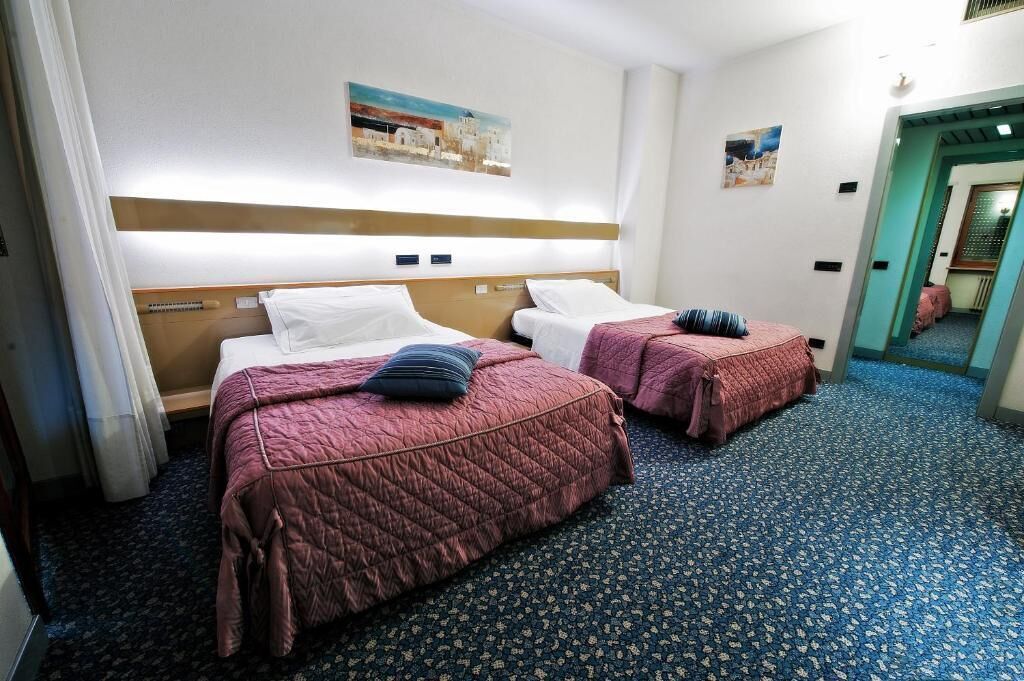 Biancheria da letto di alta qualità, minibar, insonorizzazione