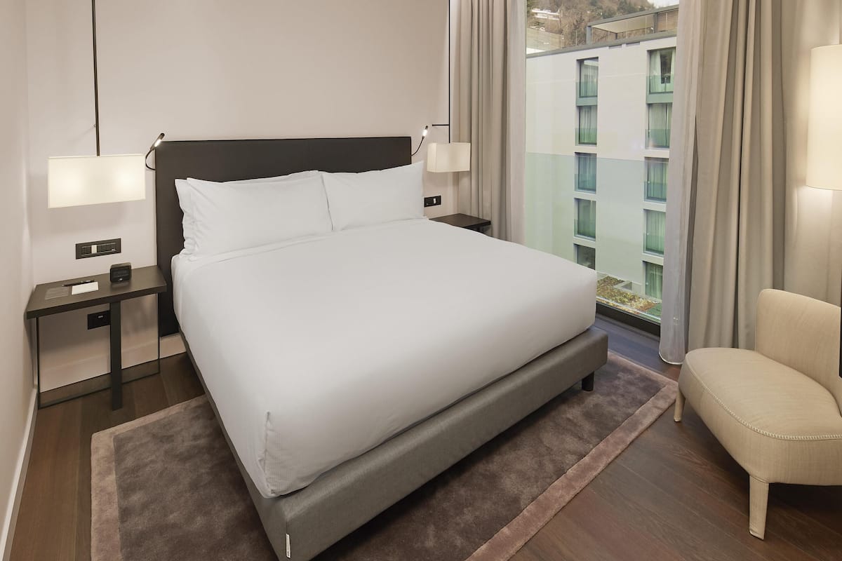 Family Room, 1 King Bed | Down duvets, in-room safe, individually furnished, desk