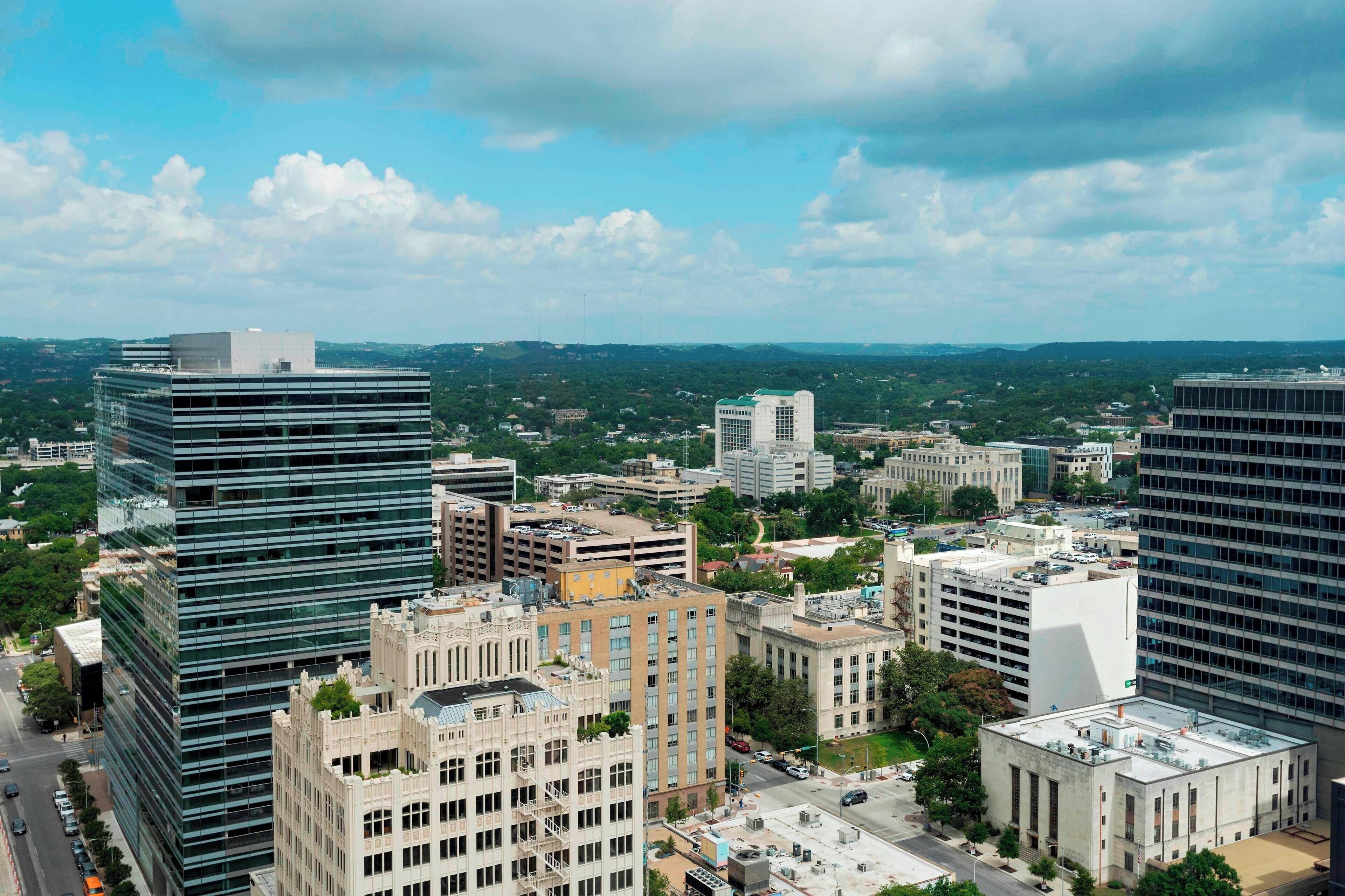 room, 2 queen beds, non smoking, city view | premium bedding, in-room safe, desk, laptop workspace