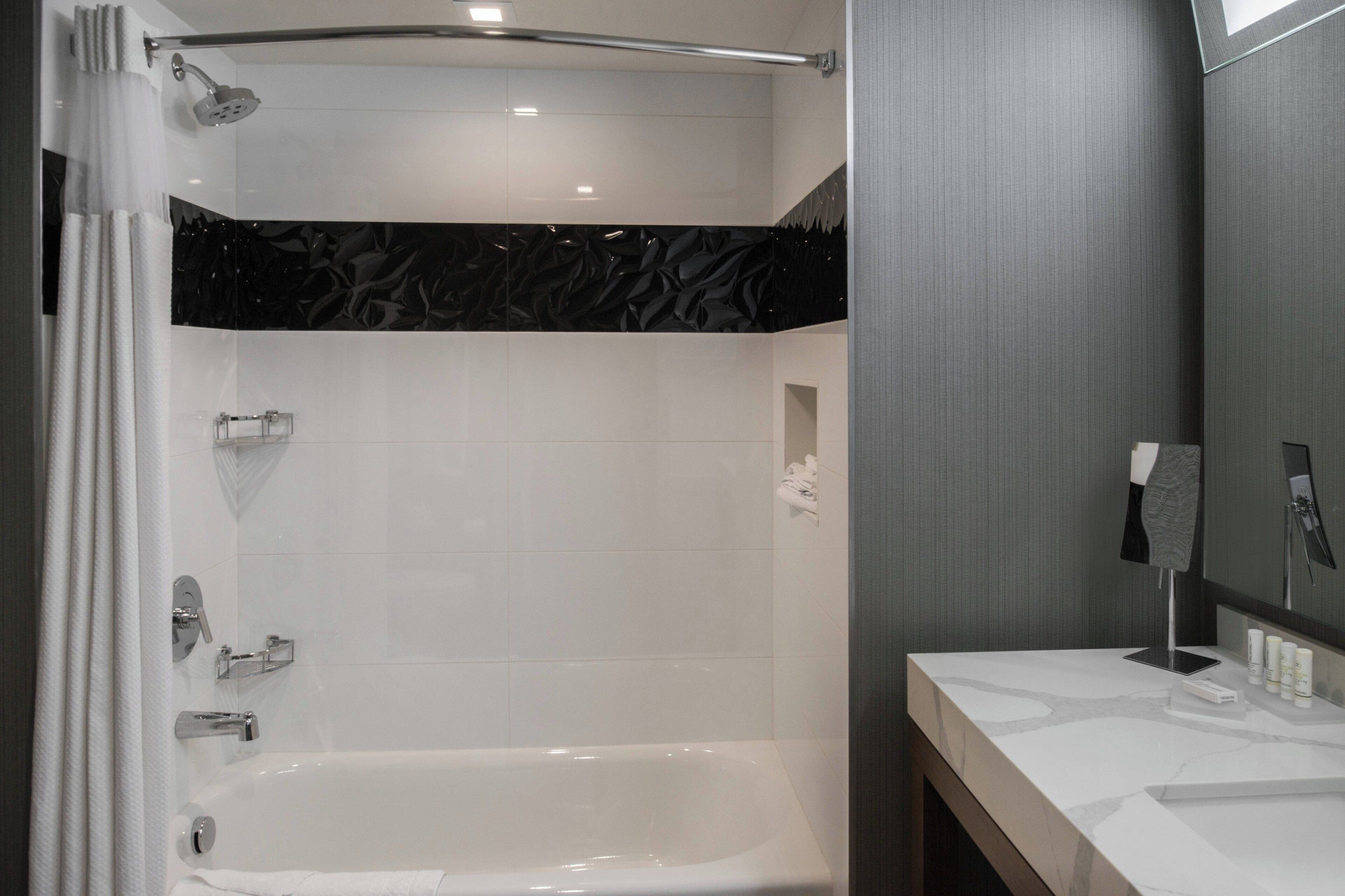 combined shower/bathtub, free toiletries, hair dryer, towels