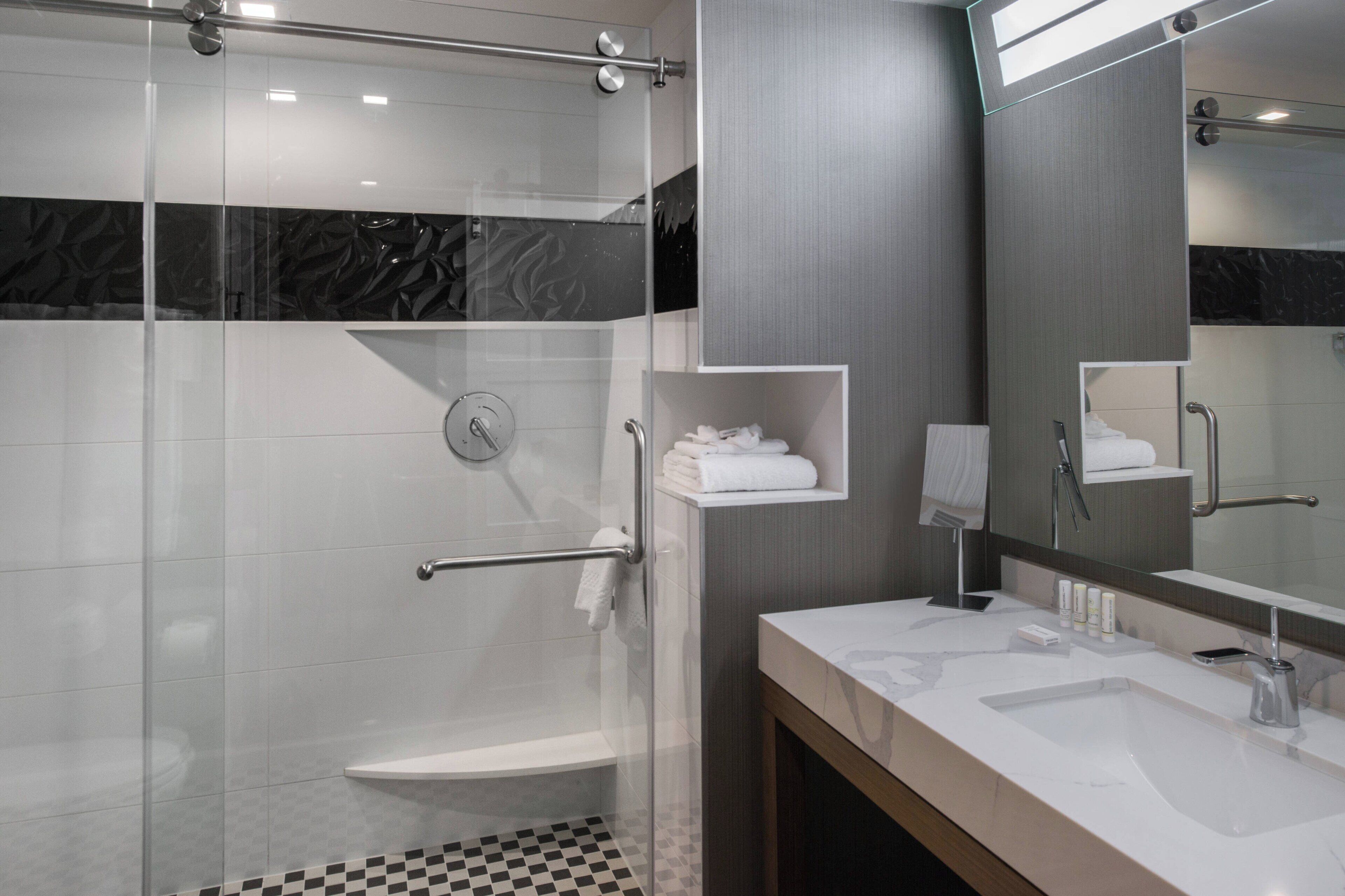 combined shower/bathtub, free toiletries, hair dryer, towels