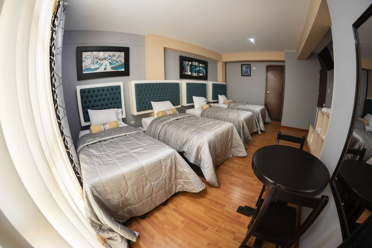 Executive Quadruple Room | Premium bedding, desk, blackout drapes, soundproofing