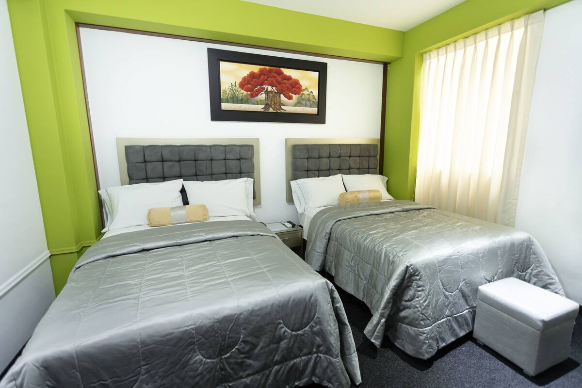 Premium bedding, desk, blackout drapes, soundproofing