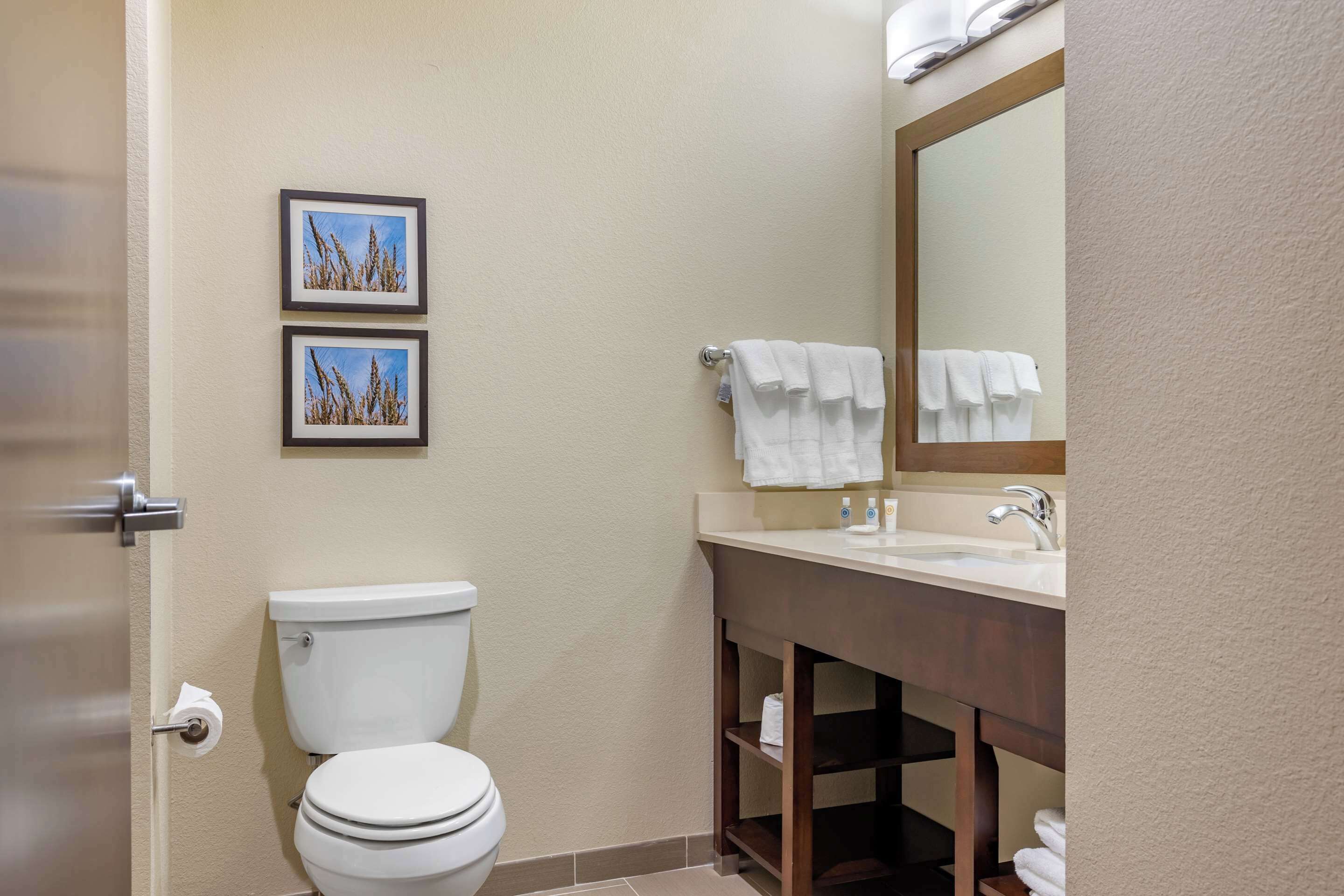 premium bedding, desk, blackout curtains, iron/ironing board