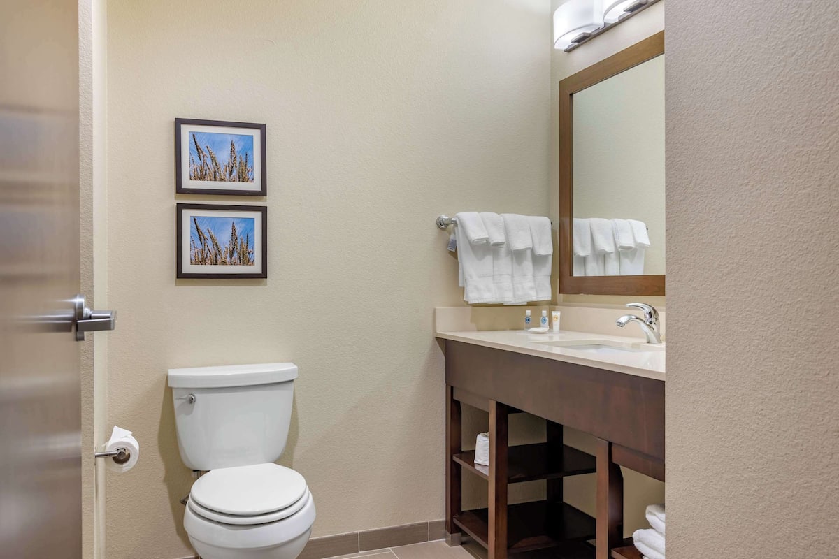 premium bedding, desk, blackout curtains, iron/ironing board