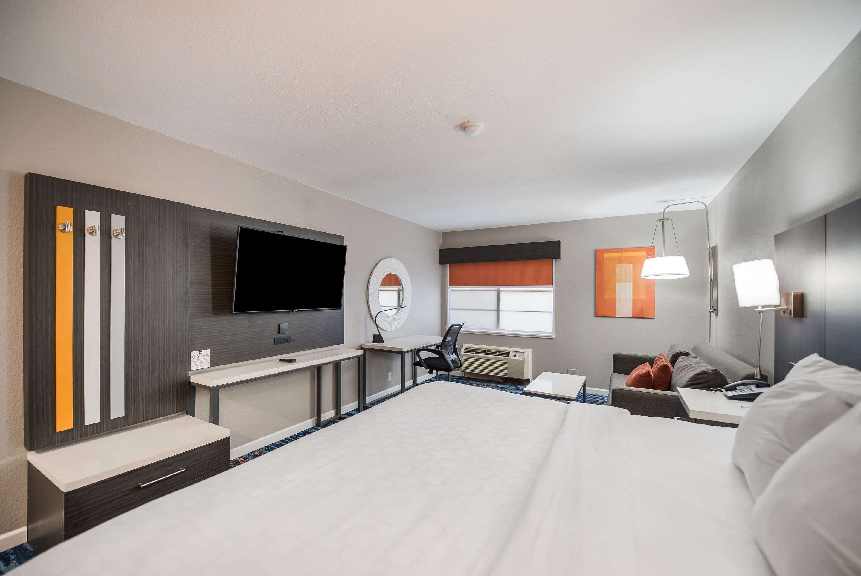 desk, laptop workspace, blackout curtains, iron/ironing board