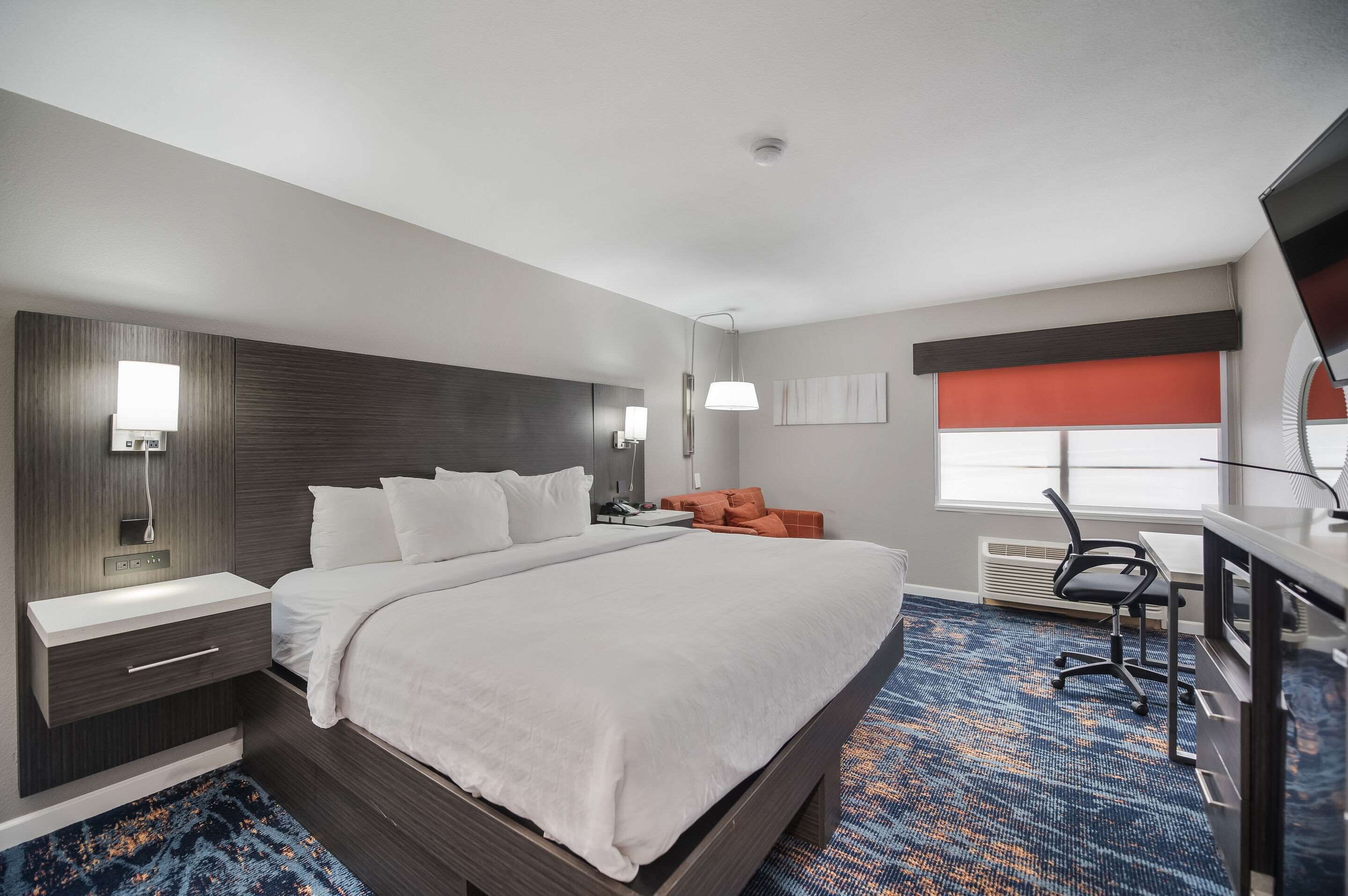 desk, laptop workspace, blackout curtains, iron/ironing board