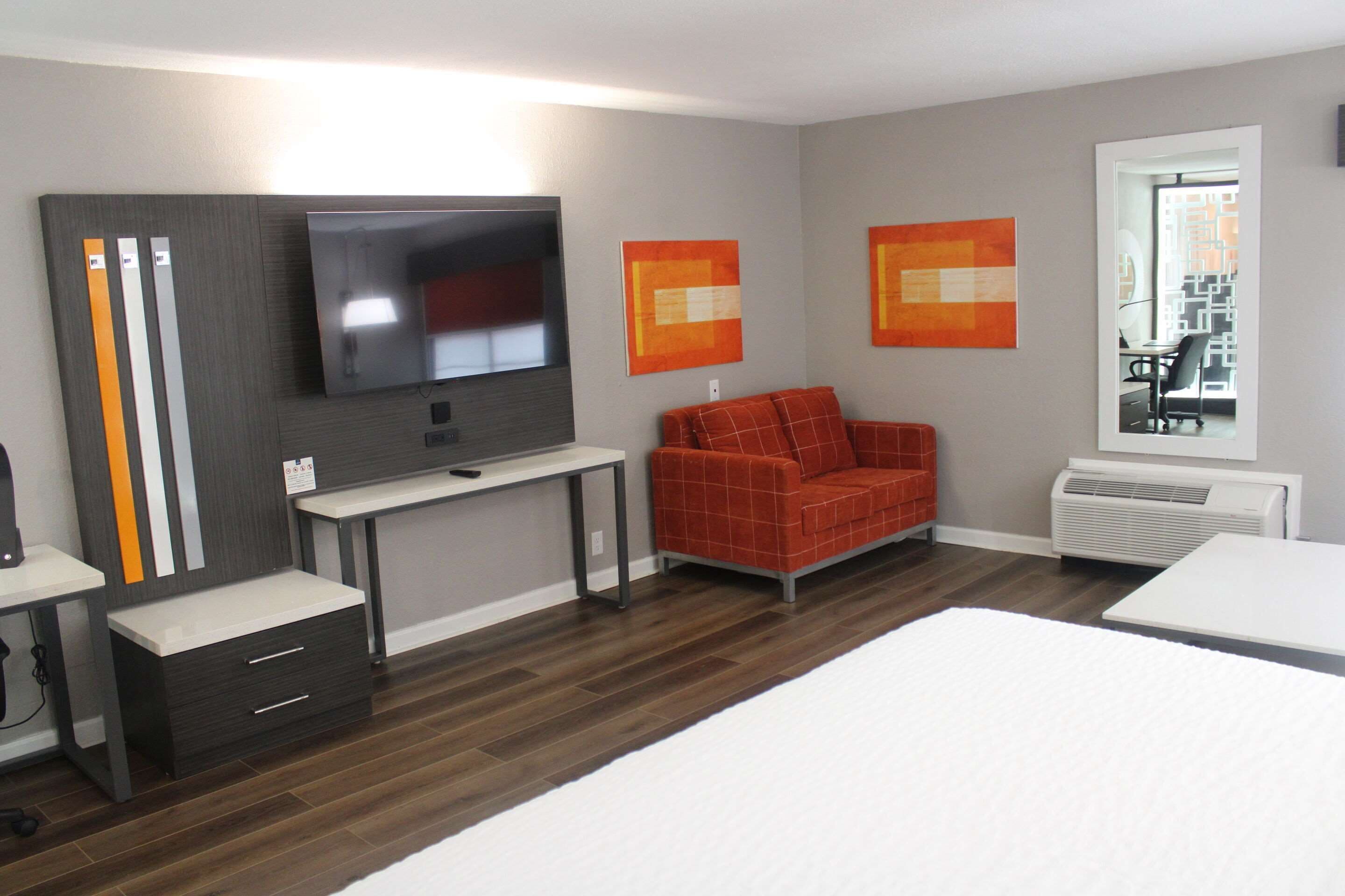 desk, laptop workspace, blackout curtains, iron/ironing board