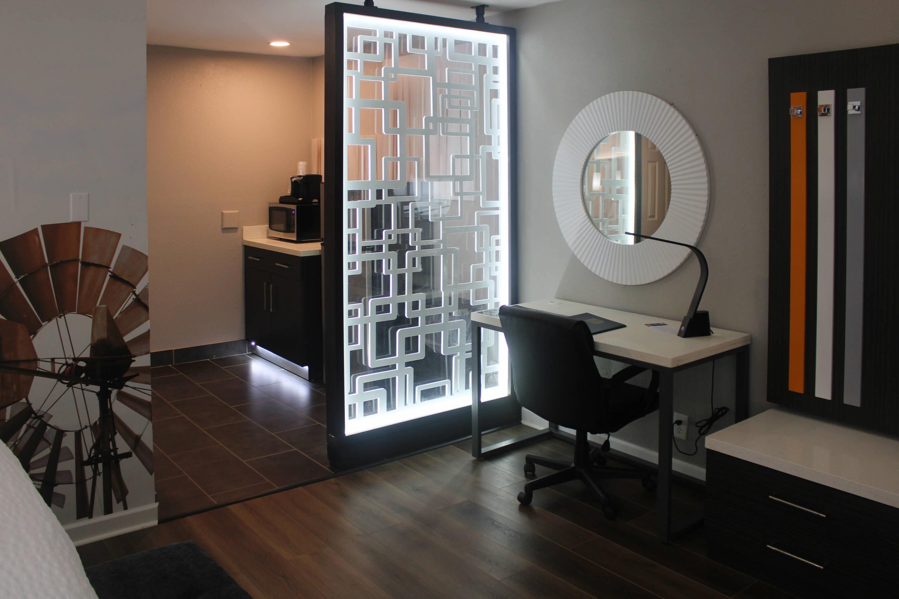 Desk, laptop workspace, blackout drapes, iron/ironing board